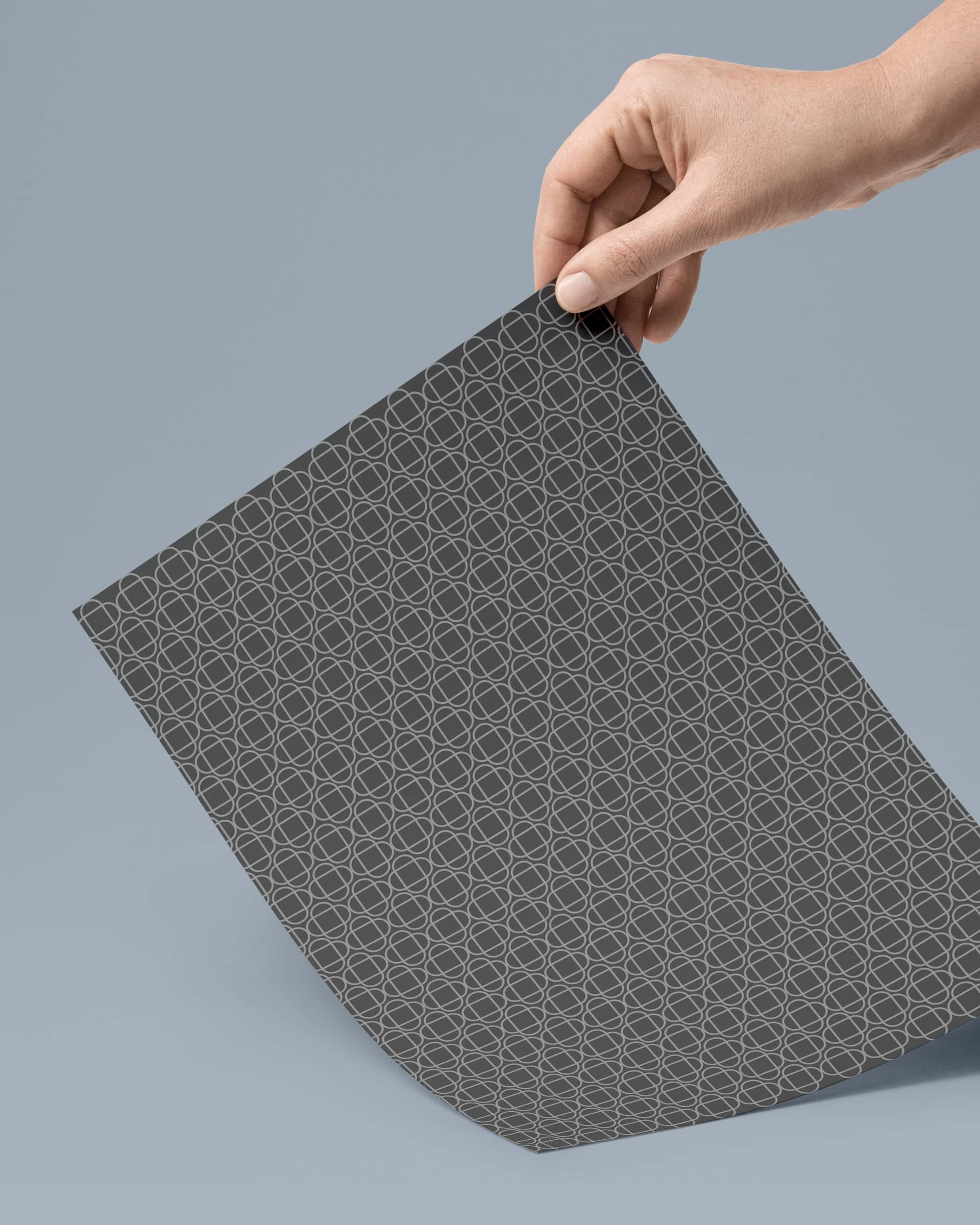Dark grey geometrical pattern design printed on paper
